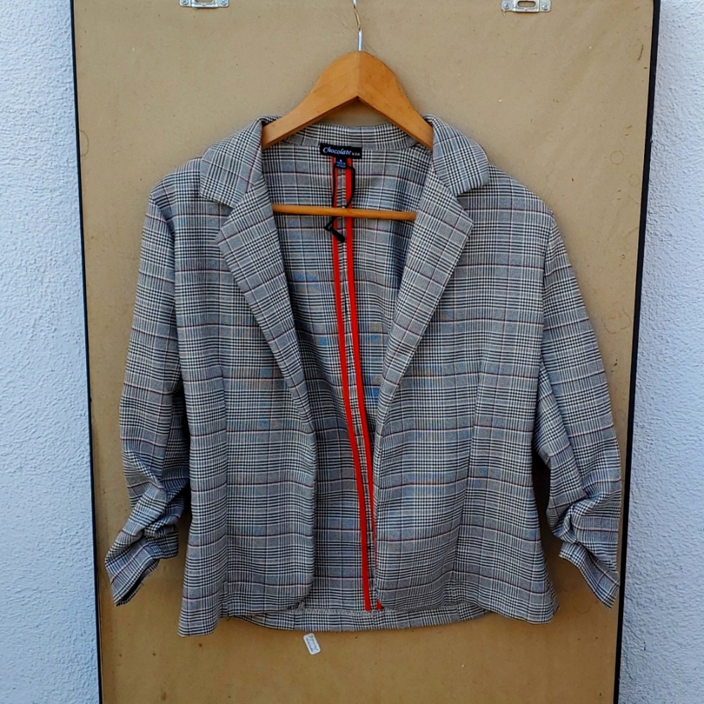 I am selling a used plaid jacket!